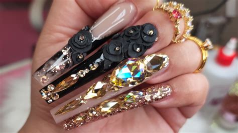Clothes are worn sausage-casing levels of tight, and youre not a buchona unless youre showing off luxury brands, preferably Versace or Louis Vuitton. . Buchona nails